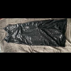 Black sequin thigh high slit dress